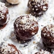 Dark Chocolate Coconut Bites with coconut sprinkled on.