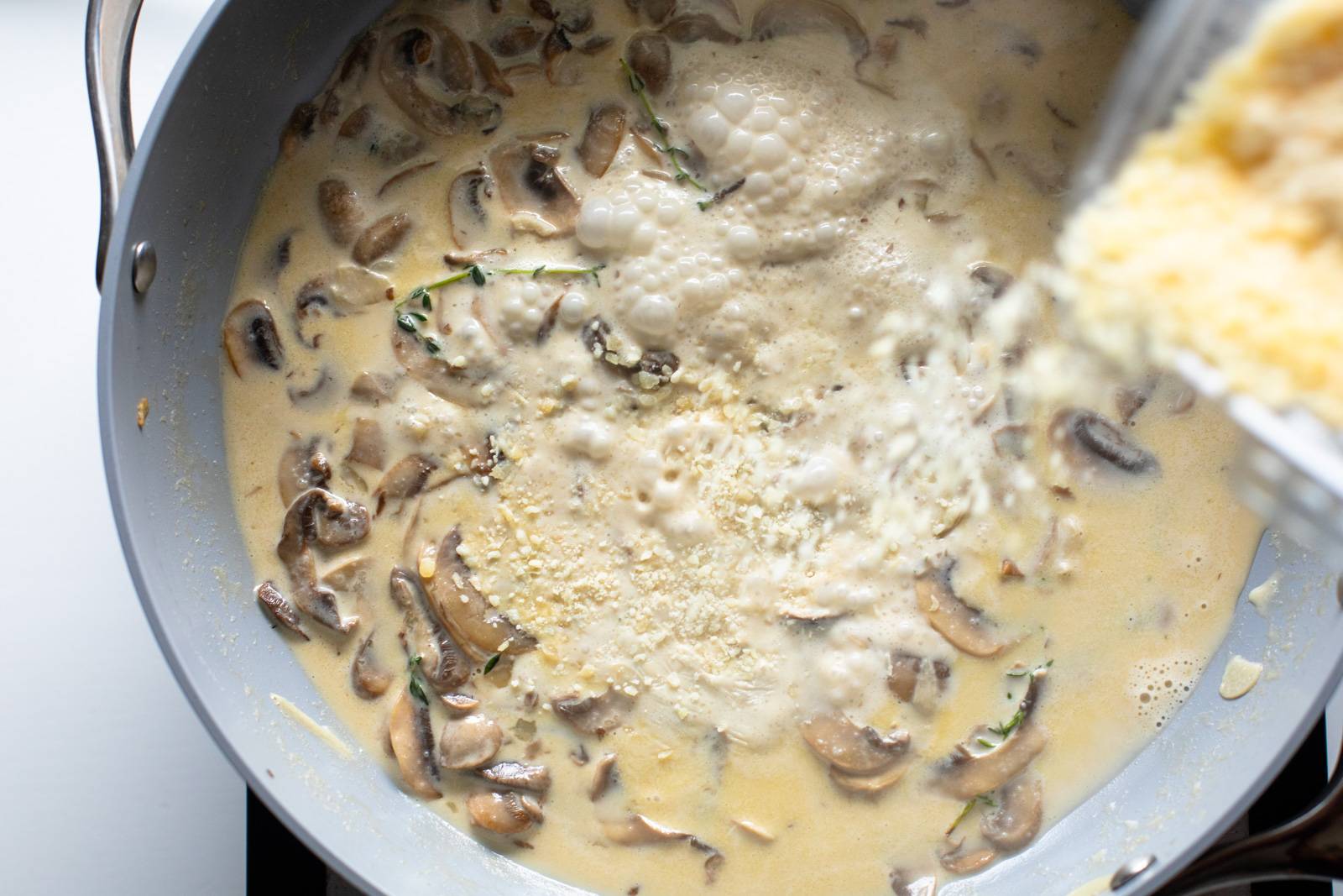Simmering mushroom sauce.